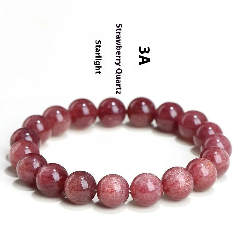A bracelet made of geometrically cut, pink strawberry quartz beads in three size options.
