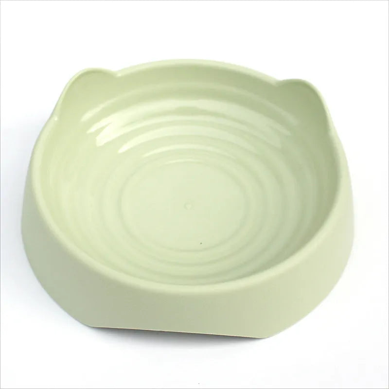 Blue ceramic dog slow feeder bowl with raised maze cups for fast-eating puppies