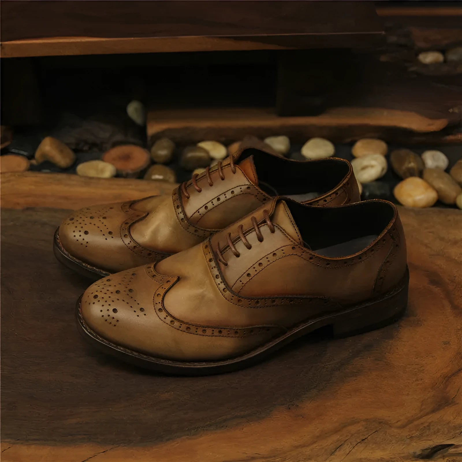 Men's light brown leather shoes with engraved distressed detailing and lace-up closure