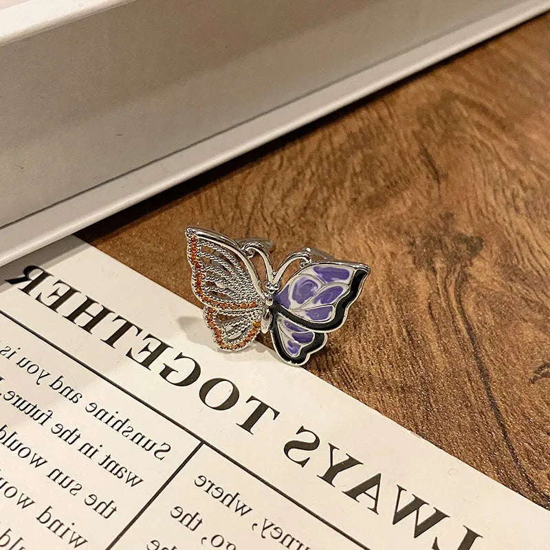 Creative Chinese butterfly women's copper ring with dripping oil treatment process in simple style.