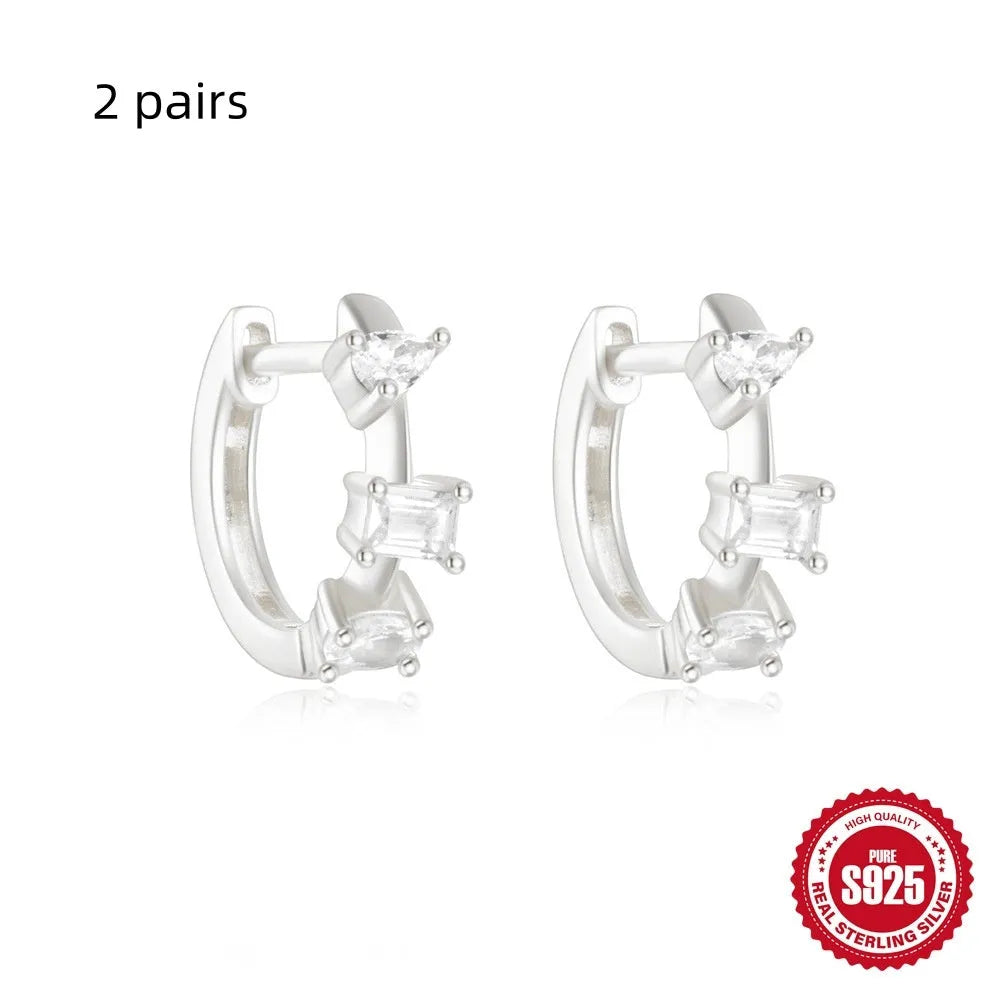Sterling silver geometric stud earrings with small round diamond accent in gold or silver finish