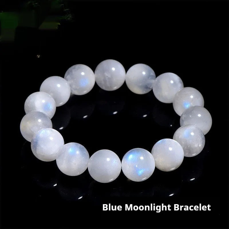 Natural blue moonlight moonstone round bead bracelet showing polished geometric beads on wrist