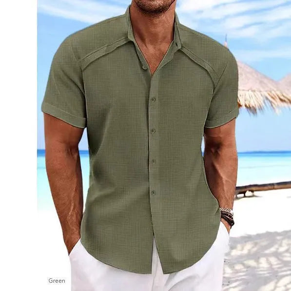 Men's solid colour short sleeve casual shirt in cotton blend fabric on a hanger.