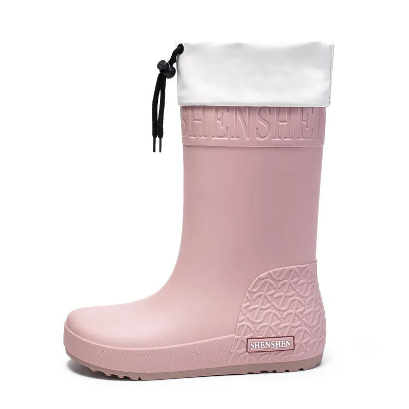 Women's PVC rain boots in apricot colour with non-slip soles and waterproof mouth detailing