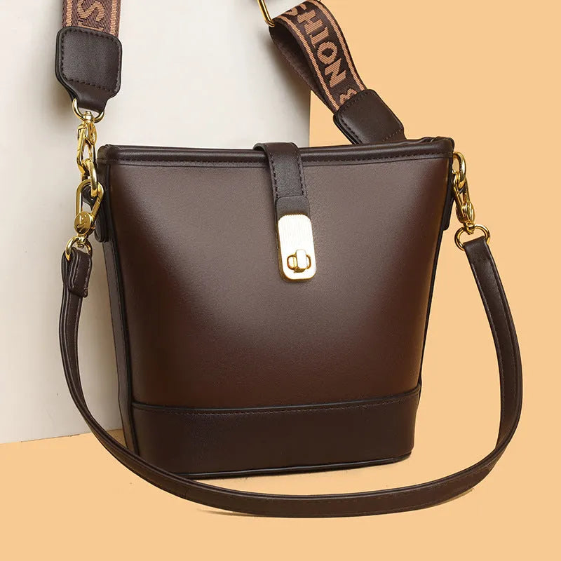 Korean style black soft PU bucket bag with double shoulder straps and multiple internal compartments