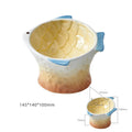 Blue fish-shaped ceramic elevated cat bowl with tilted design on a non-slip base.