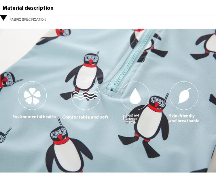 Blue boys two-piece penguin swimsuit with long sleeves and a matching swim cap.