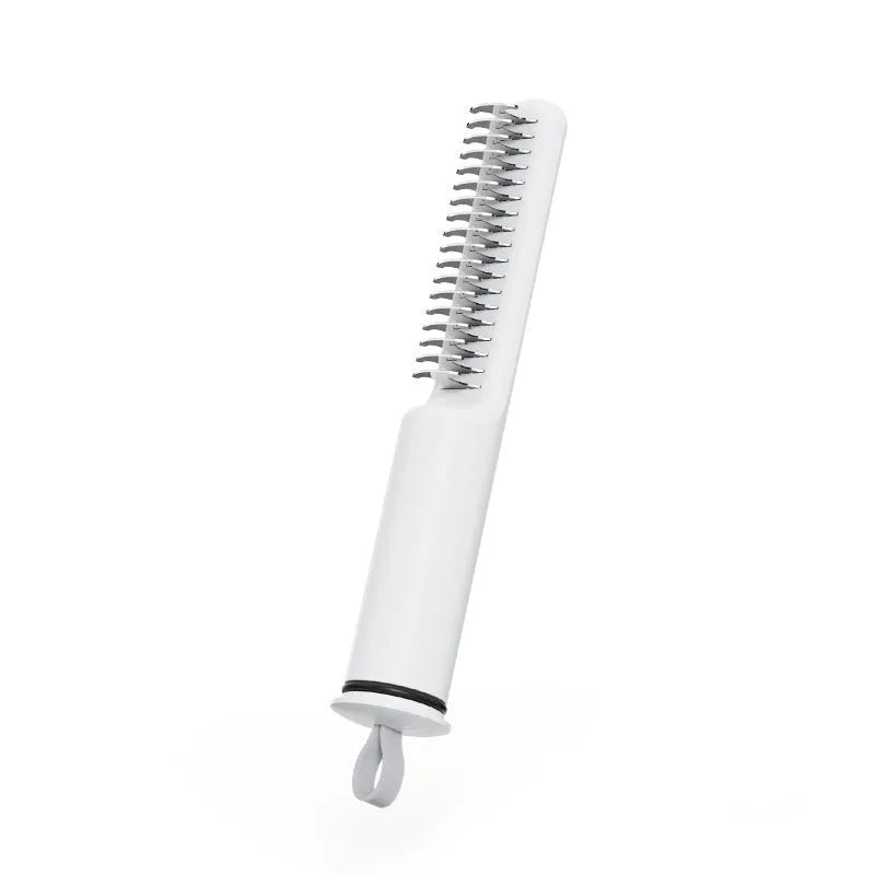 Stainless steel dog dematting comb with a handle, shown in pink and white colour options.