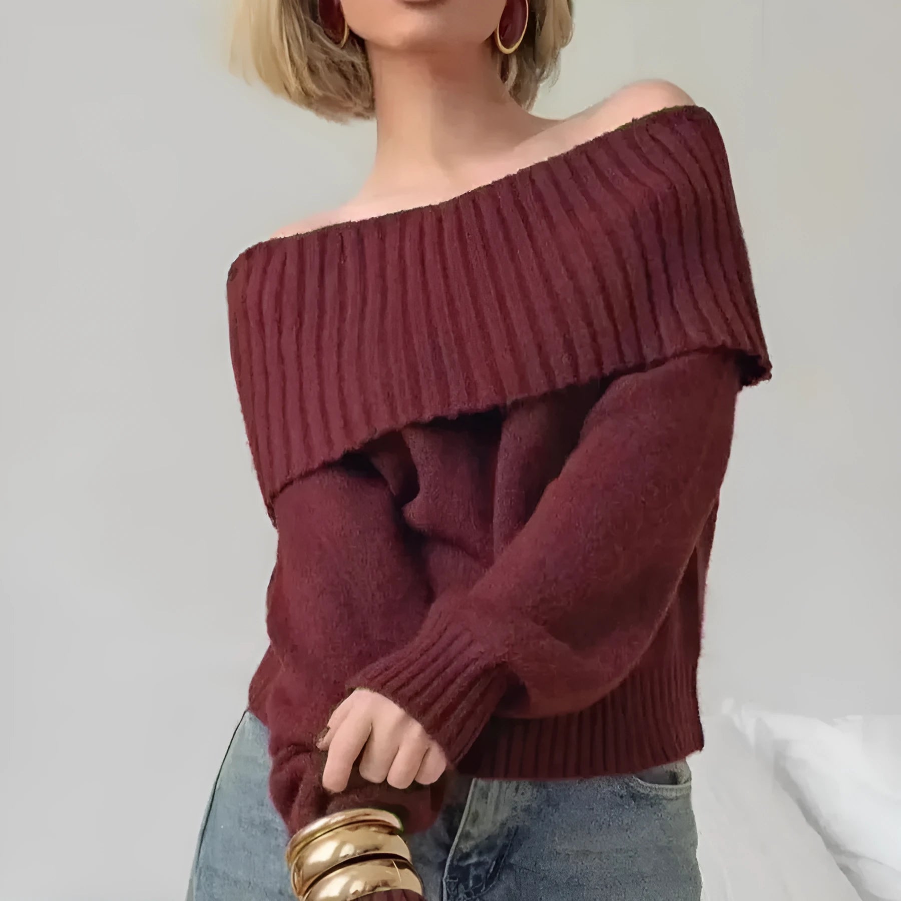 Off-the-shoulder grey acrylic sweater with 3D pattern effect and strapless design
