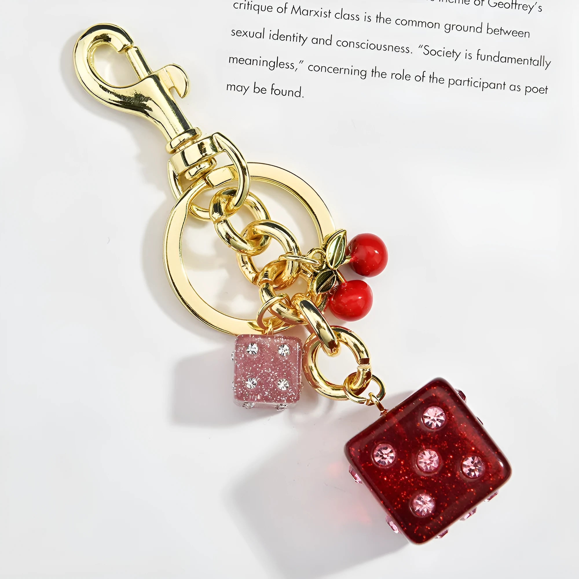 Cherry two-tone dice keychain pendant with square pattern metal design