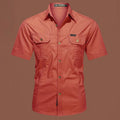 Men's short sleeve cotton work shirt in a loose fit, shown in army green colour.