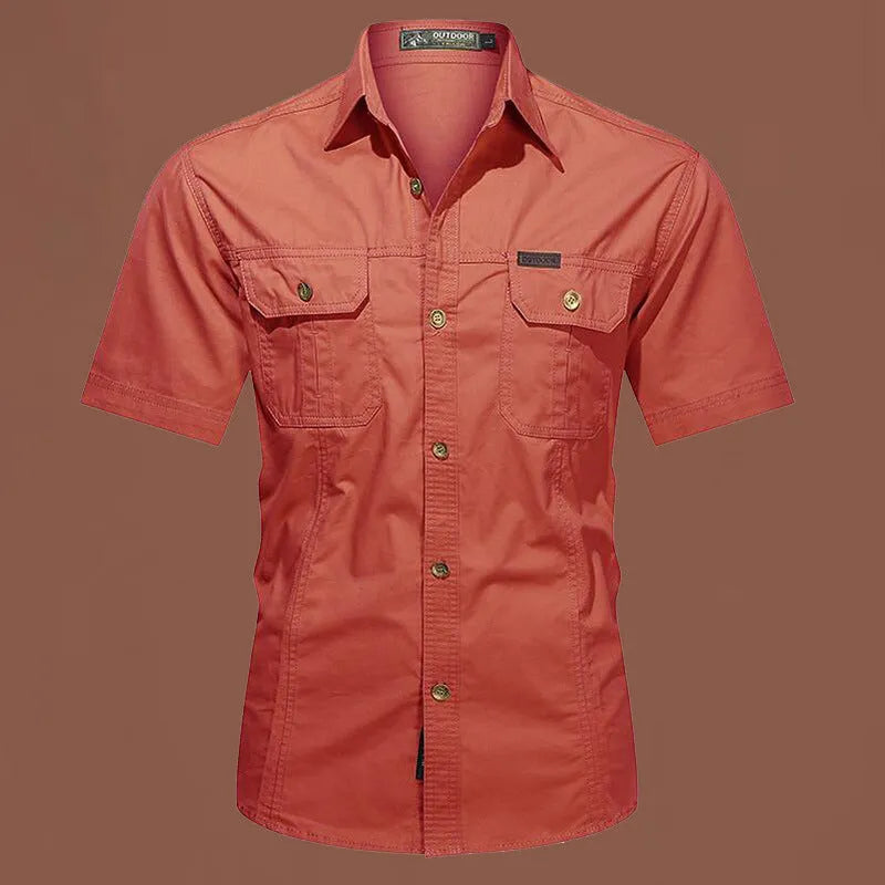 Men's short sleeve cotton work shirt in a loose fit, shown in army green colour.