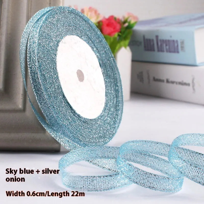 Roll of narrow 0.6cm wide polyester satin ribbon in a choice of colours, showing 22 metre length.