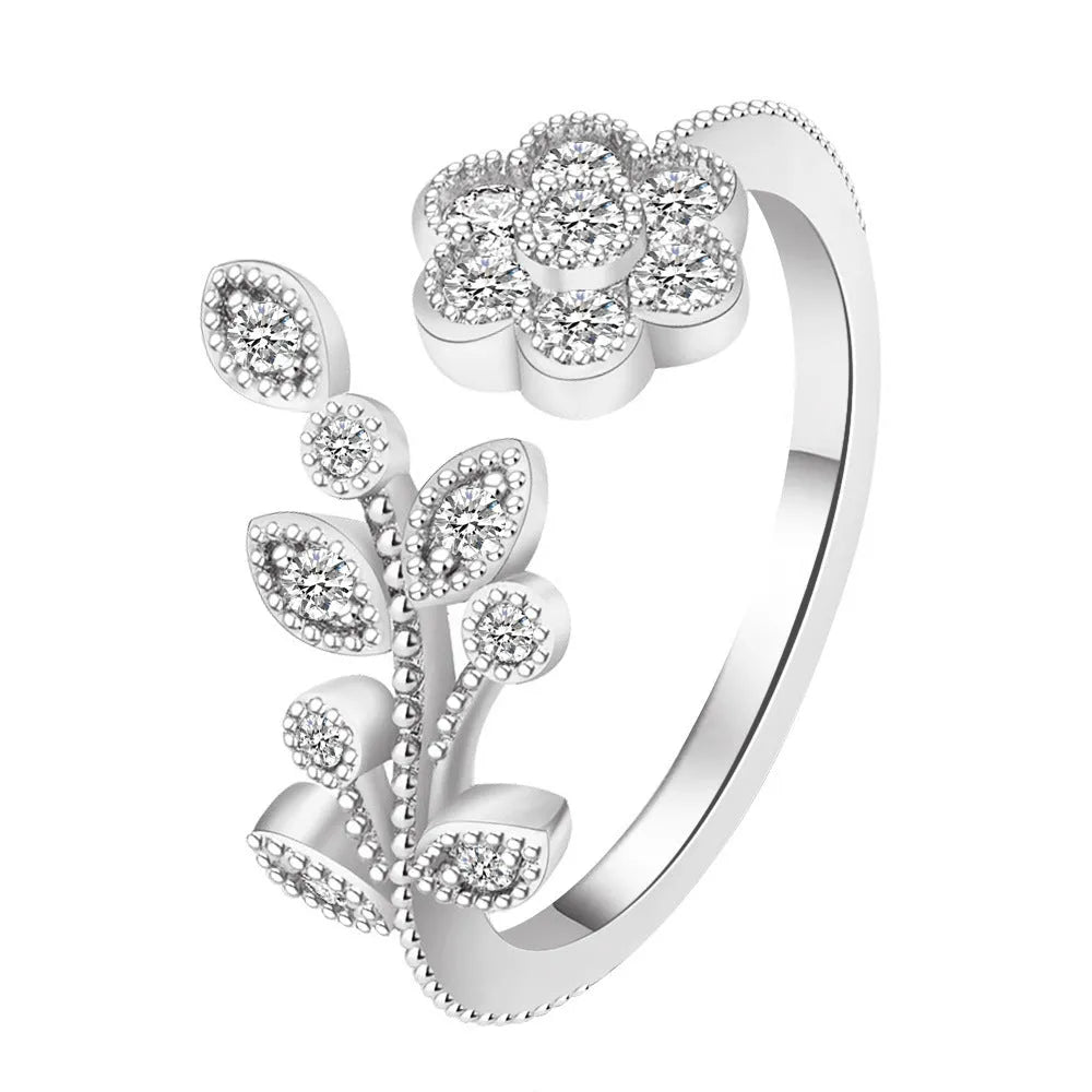 Women's open ring with diamond-treated flower and leaf designs on copper in gold colour option