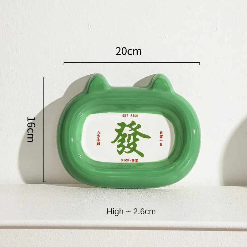 Ceramic pet bowl with animal design, 13.5cm diameter, for cat and small dog food or water.