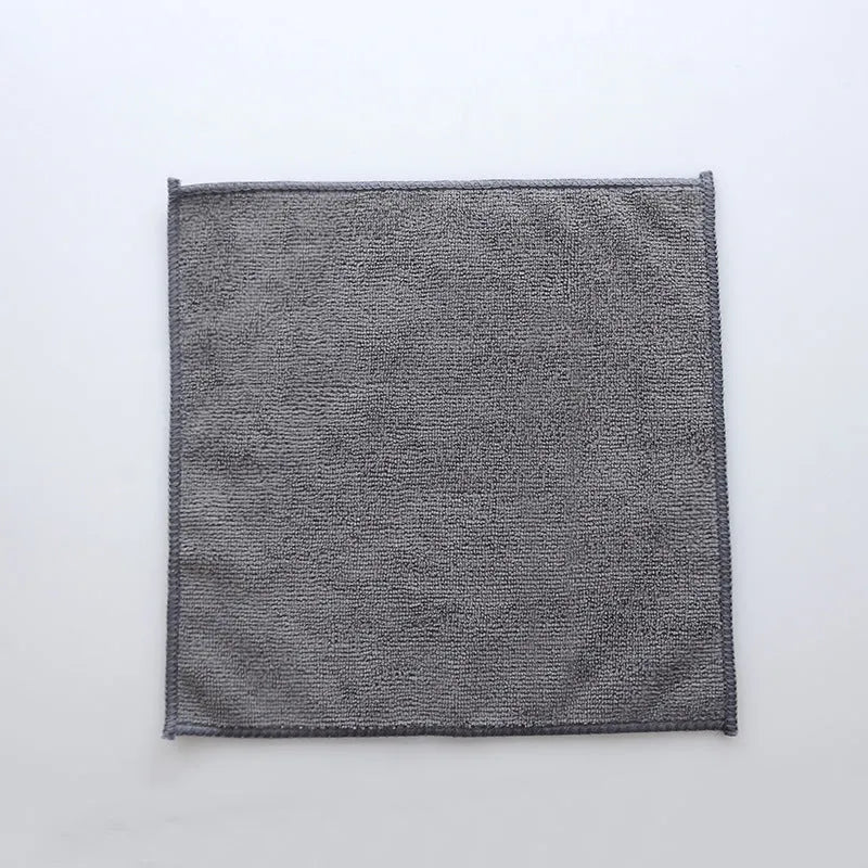 Grey microfiber kitchen cleaning cloth measuring 25cm square for oil and food residue removal
