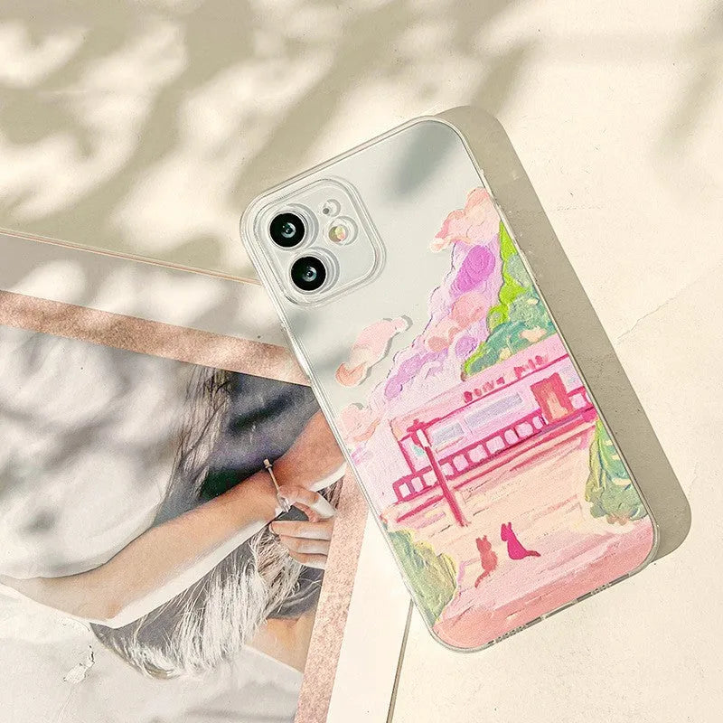 Soft Silicone iPhone case with a colourful cartoon design of two cats on the back.