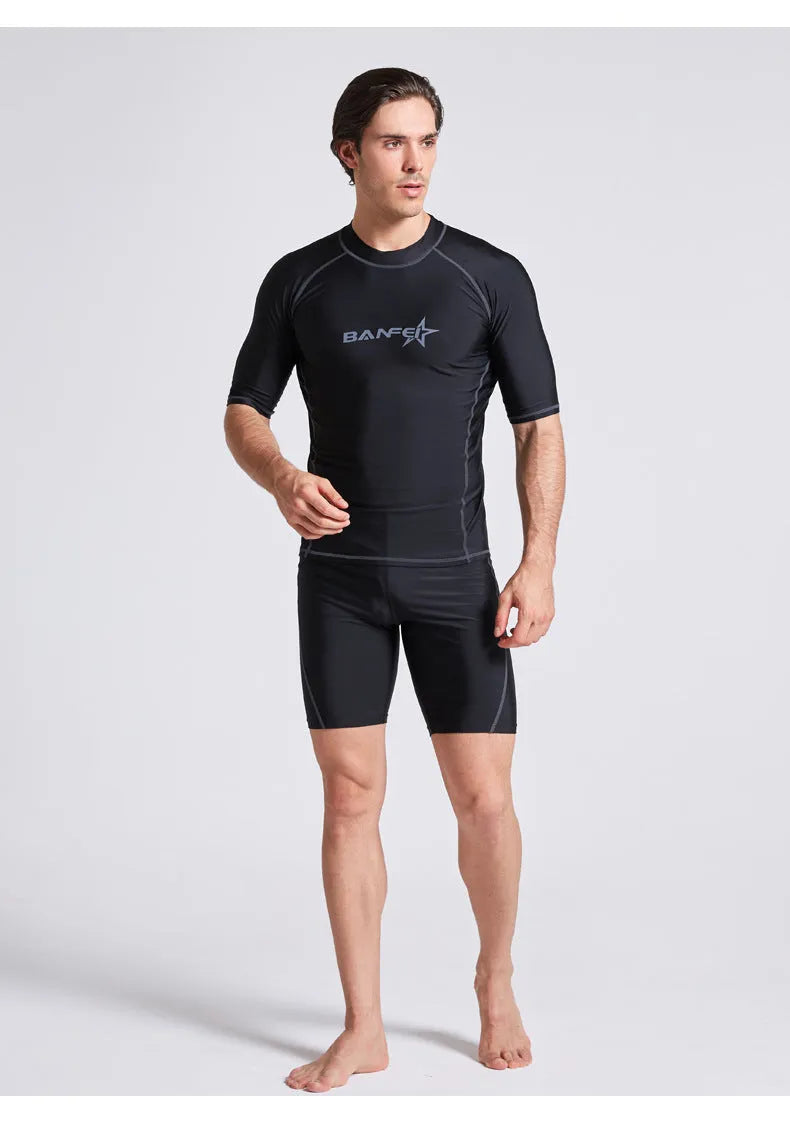 Men's navy blue half sleeve swimsuit top and pants set for swimming