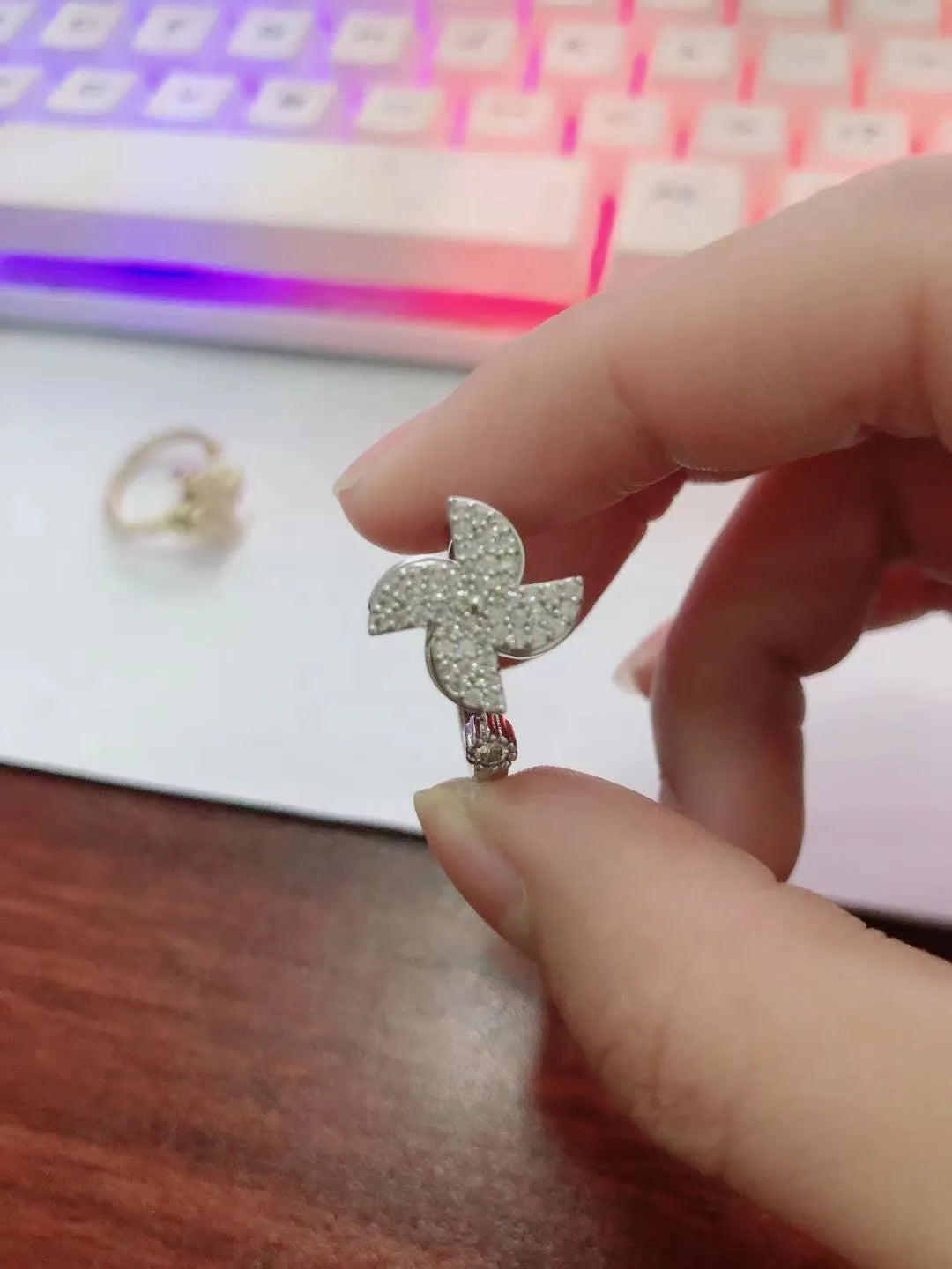 Rotating windmill ring with micro-inlaid design in gold or silver electroplated finish