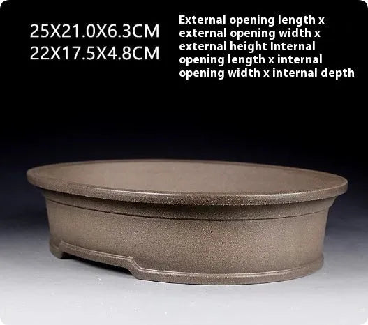 Handmade oval purple sand clay bonsai pot measuring 25x21x6.3cm for succulents