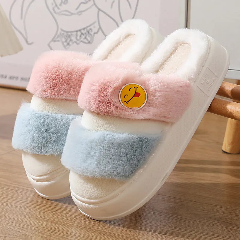 Cartoon-style pink and green thermal plush slippers with cashmere lining.