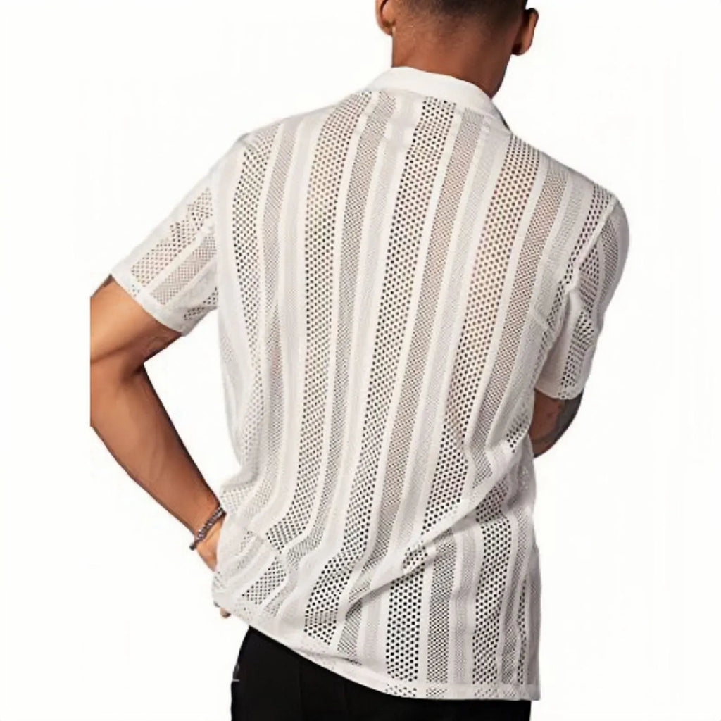Man wearing a black jacquard knit short-sleeve cardigan shirt with button front.