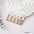 Set of four Morandi colour magnetic bookmarks showing miniature size and magnetic closure design