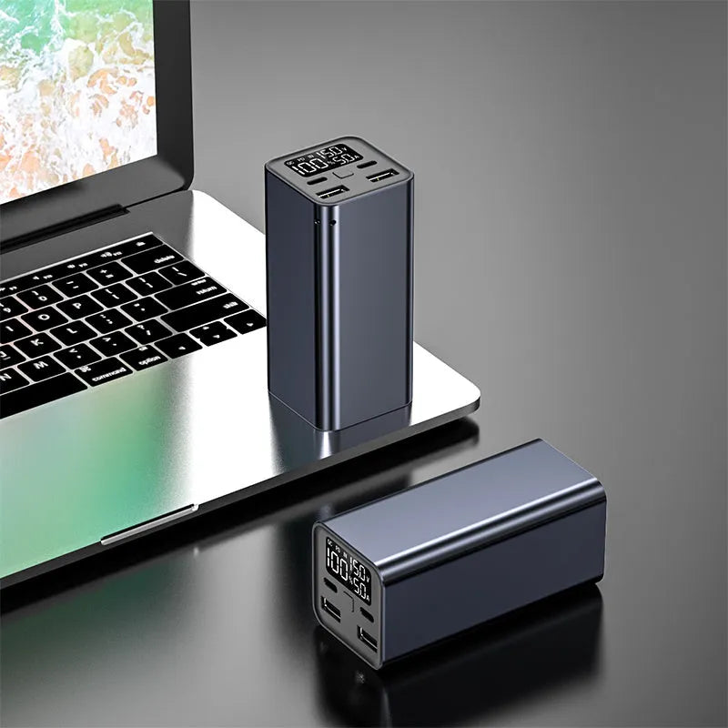High-power 65W 20000mAh metal laptop charging bank in black, blue, or grey.