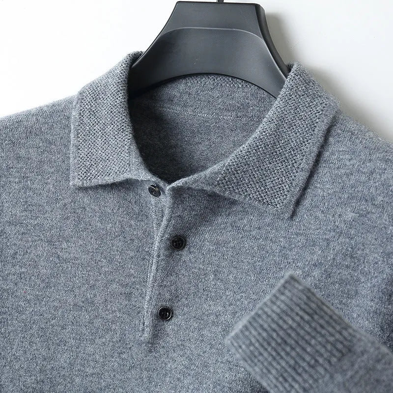 Man wearing a men's grey polo collar wool sweater pullover with long sleeves.
