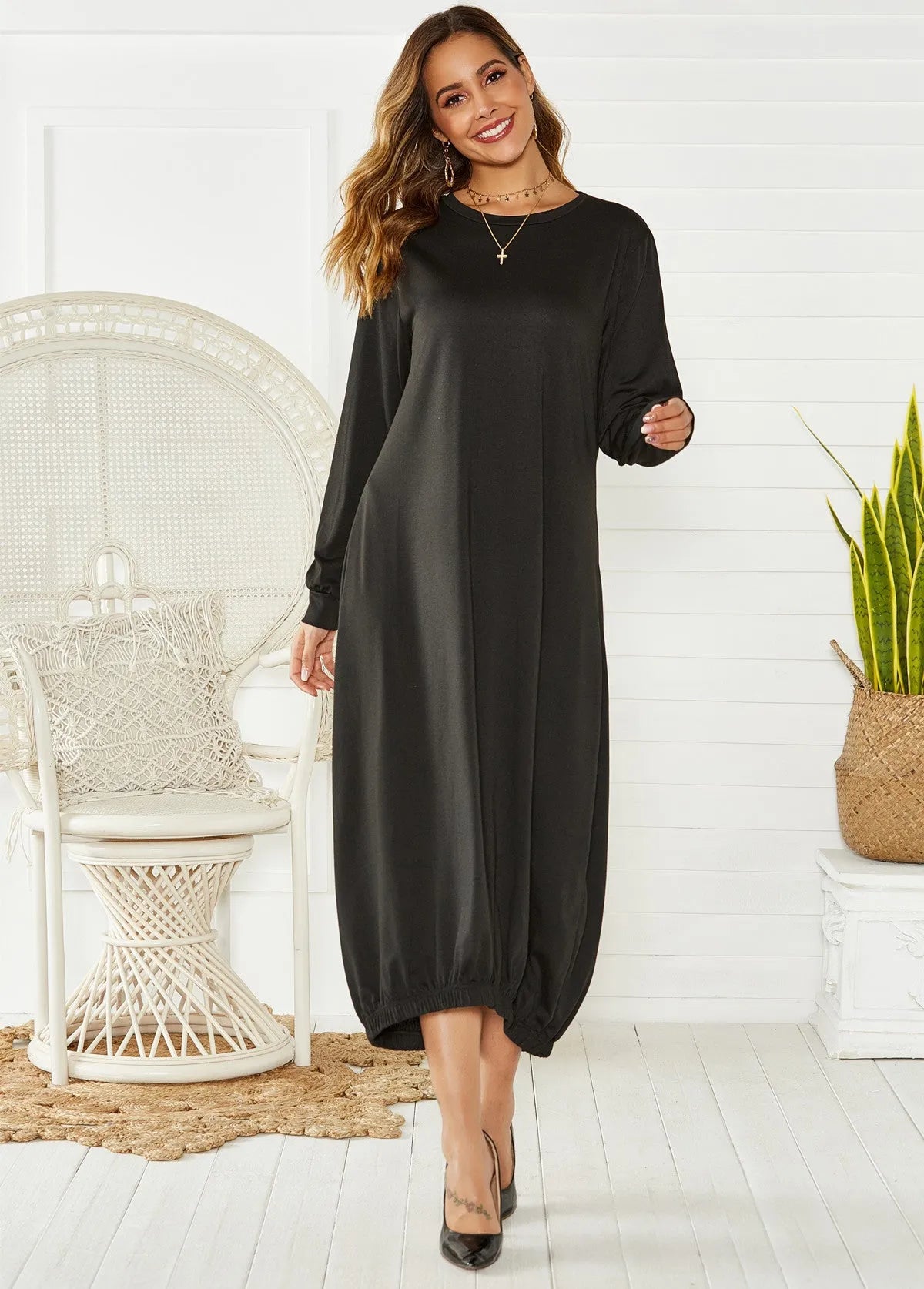 Loose lantern dress with lace-up crew neck in black or grey polyester knit fabric