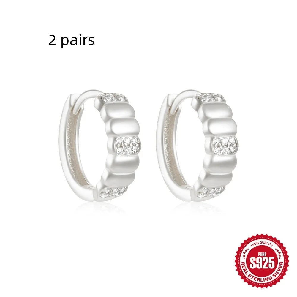 Sterling silver geometric stud earrings with small round diamond accent in gold or silver finish