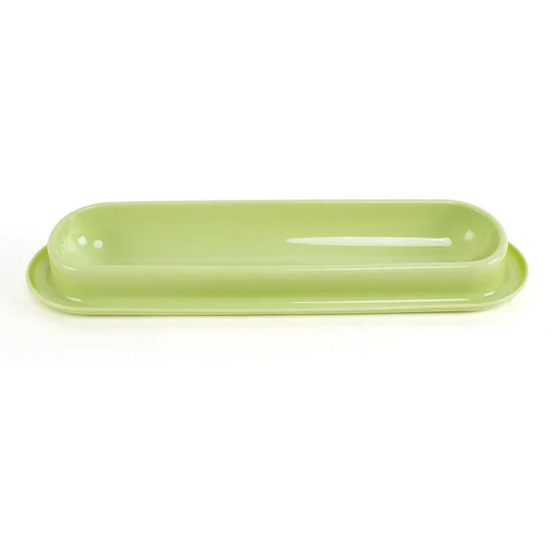 Green leakproof dual pet bowl feeder with non-slip base for dogs and cats.