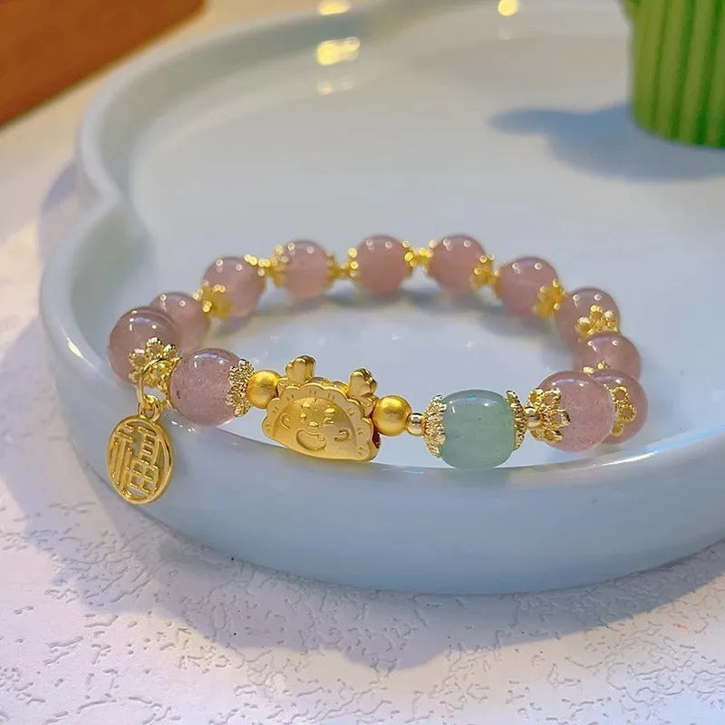 Floral glazed zodiac bracelet with glass beads and coloured glaze animal charm