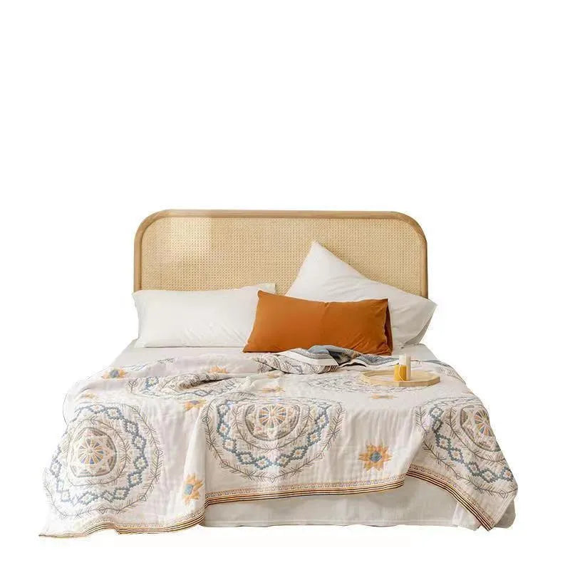Cotton geometric pattern towel blanket laid flat, showing modern simplicity design