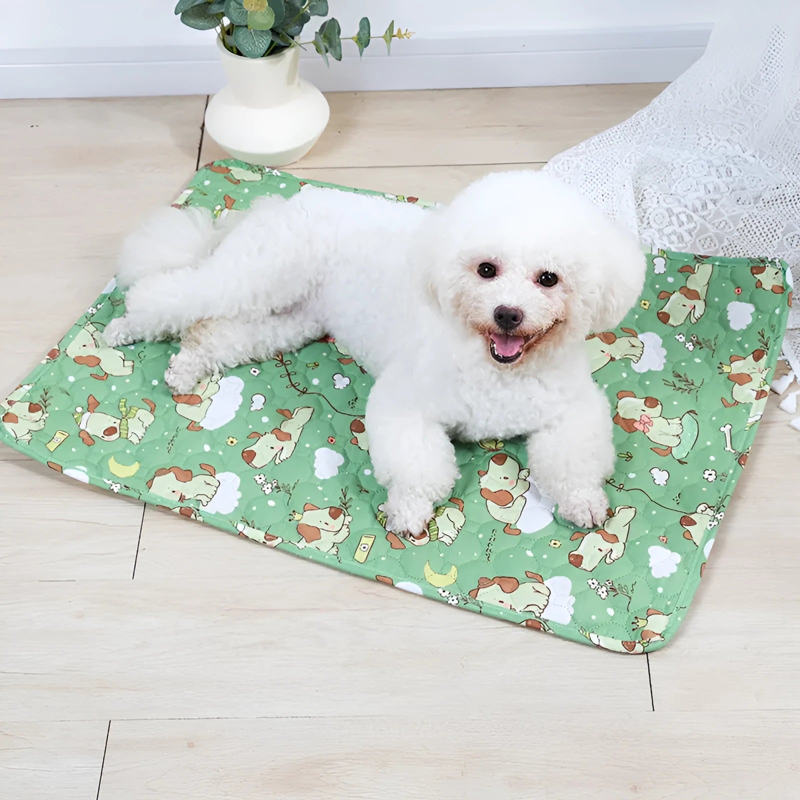 Reusable washable pet urine pad with colourful animal print and waterproof non-slip backing.