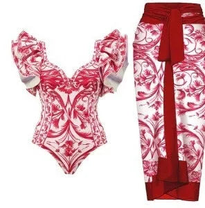 Women's printed one-piece swimsuit with matching cover-up skirt in rose pink.