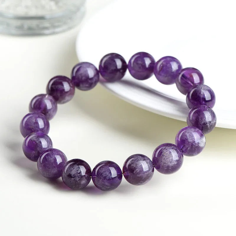Natural feather amethyst crystal bracelet in Snow Mountain purple colour with scattered beads design