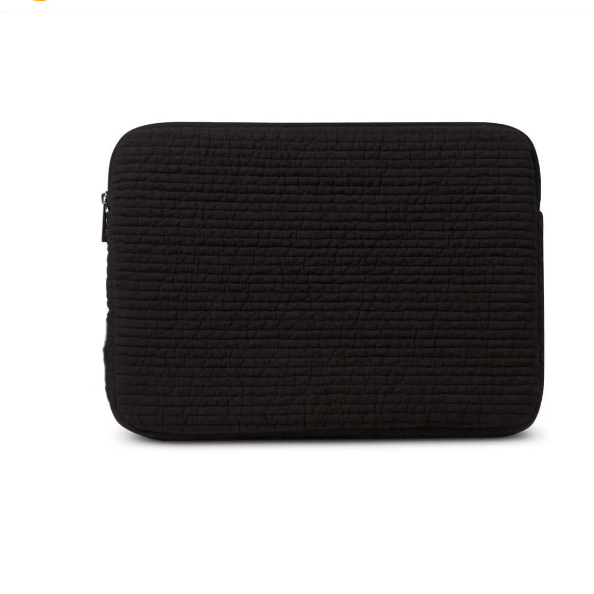 Black and white cotton cloth clutch-style laptop bag for tablets, showing internal coin pocket.