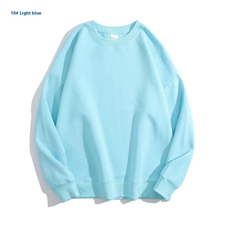 Women's loose fit cotton off shoulder sweater in a solid colour with round neck and long sleeves.
