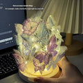 Butterfly-themed small night lamp with glass shade and raw wood base, 12x15 cm.