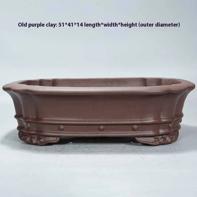 Purple sand handmade rectangular antique flower pot on desktop