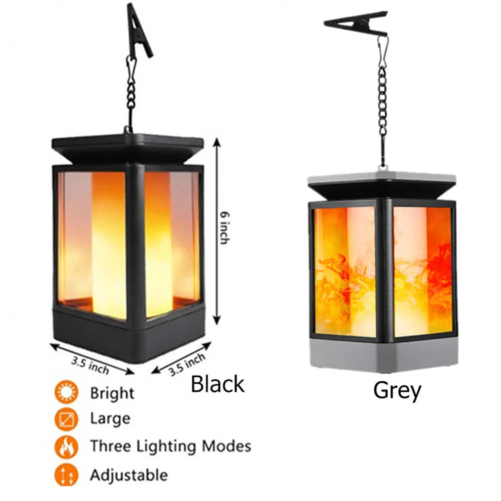 Antique flame style solar garden lamp with LED lights in outdoor setting