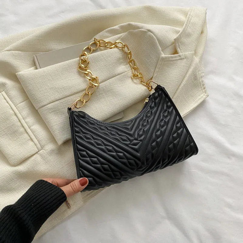 Brown pleated chain baguette shoulder bag showing vertical square shape and adjustable 50cm strap