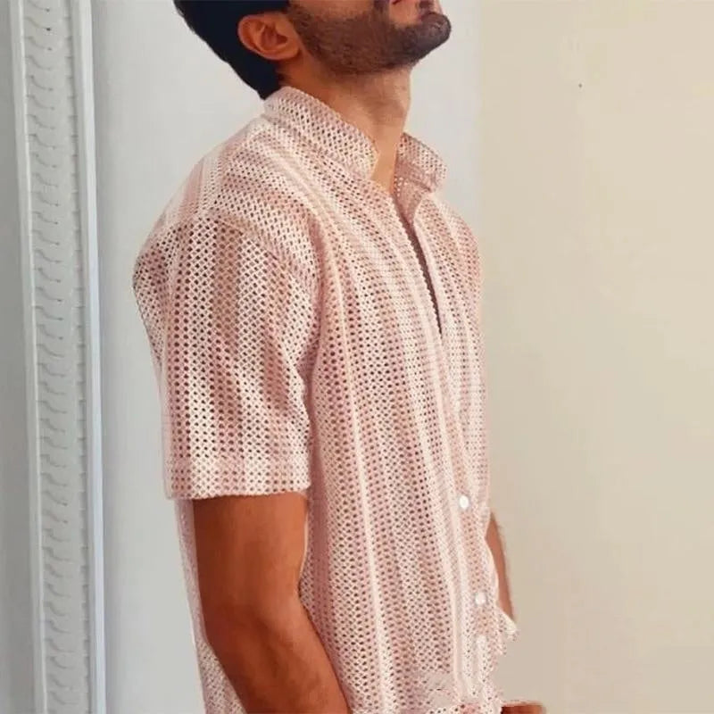 Pink men's loose-fit waffle knit short sleeve cardigan shirt on a hanger