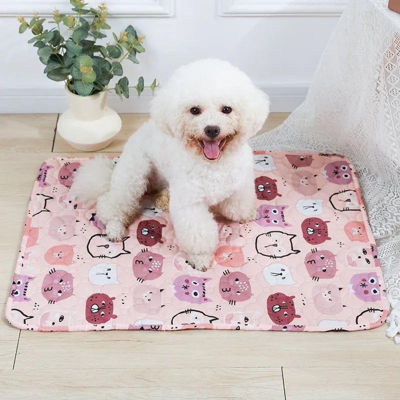 Reusable washable pet urine pad with colourful animal print and waterproof non-slip backing.