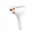 Pink and white three-in-one ice-sensing laser hair removal device with shaver and accessories