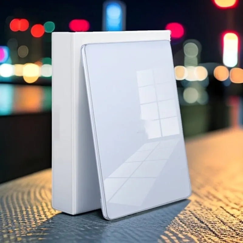 Transparent plastic hard shell protective case for a MacBook laptop on a table.