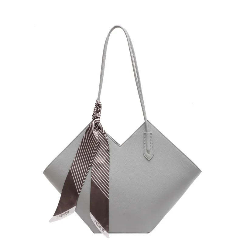 Women's large capacity shoulder bag in horizontal square shape showing black and brown colour options