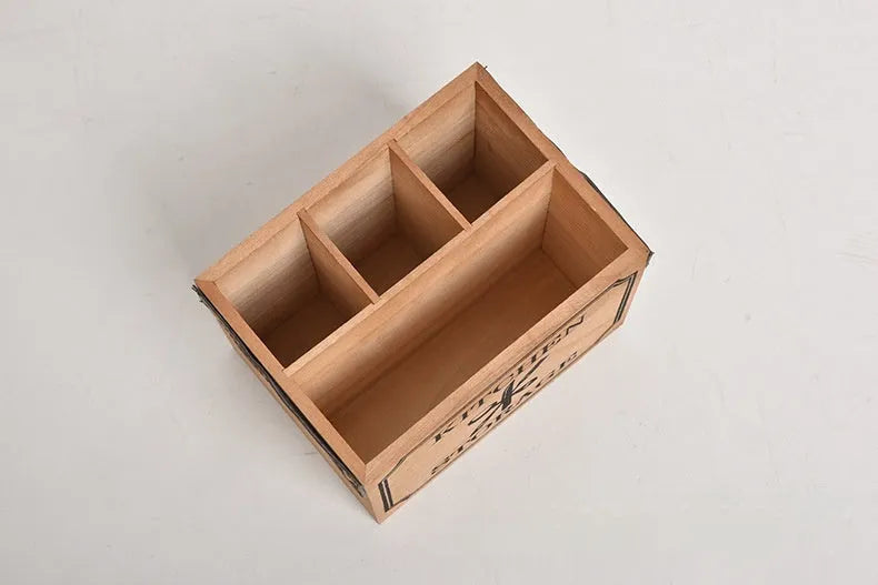 Solid wooden kitchen storage box with internal grid divider for knives, forks, and chopsticks.