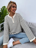 Black striped women's knitted top with drop shoulder sleeves and button detailing